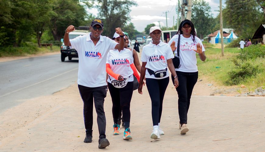 Four Mombasa Walk Movement members walking towards Kongo River